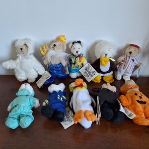 Collectible teddy bears from the Ganz brand, specifically from the Wee Bear Vill